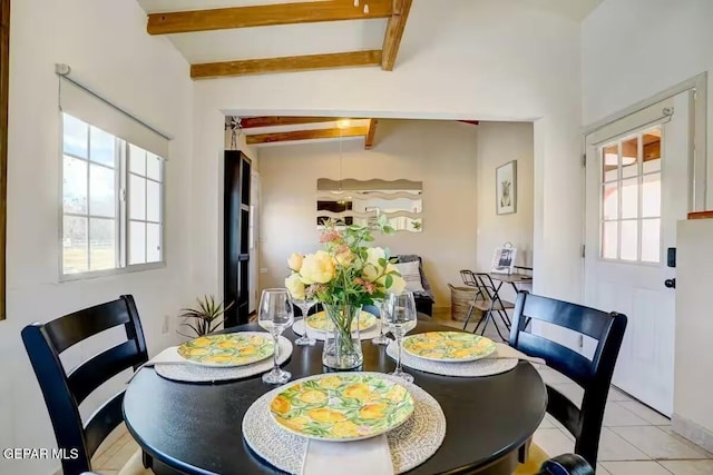 tiled dining area with beam ceiling