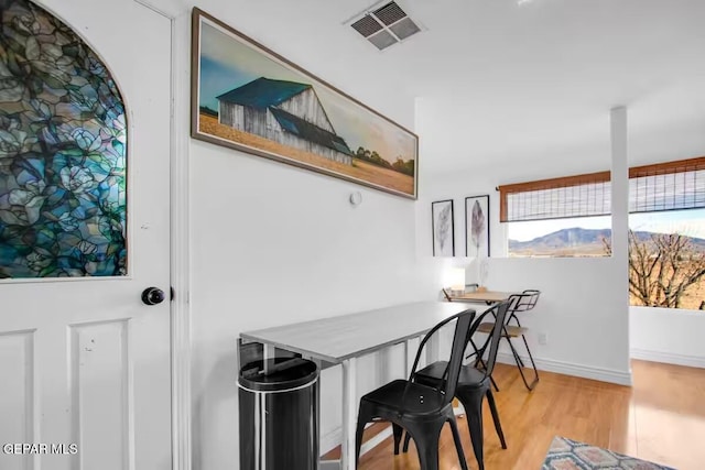 dining room with light wood-type flooring