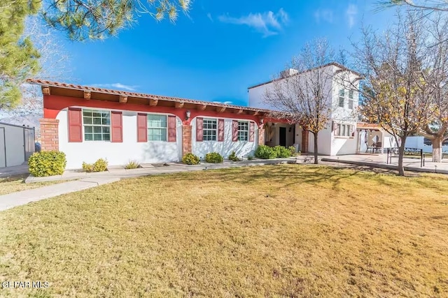 view of front of house with a front yard