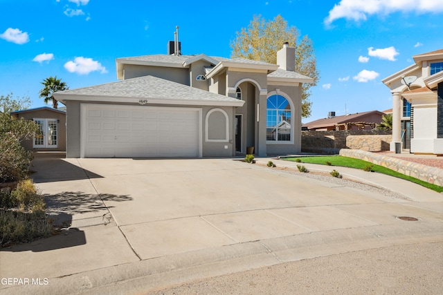 view of front of home with a garage