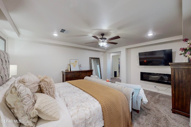 bedroom featuring ceiling fan and carpet floors