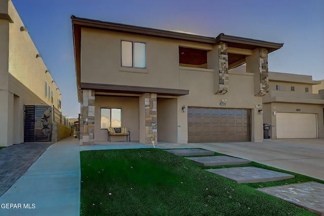 view of front of home with a garage