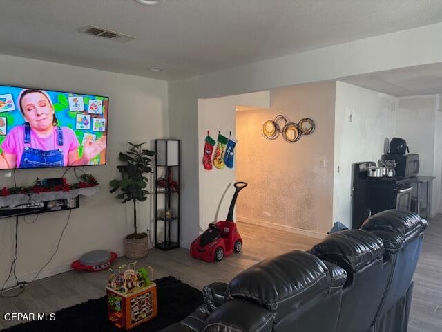 living room with hardwood / wood-style flooring