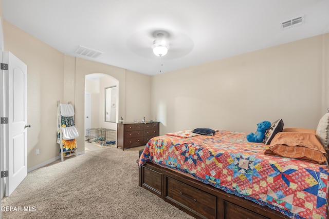 bedroom with ceiling fan and carpet floors