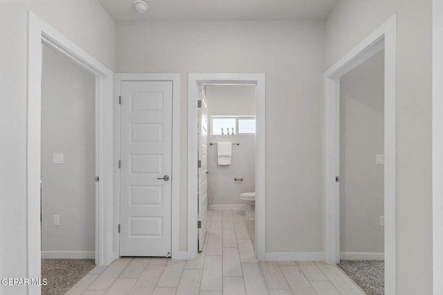 hallway featuring light hardwood / wood-style floors