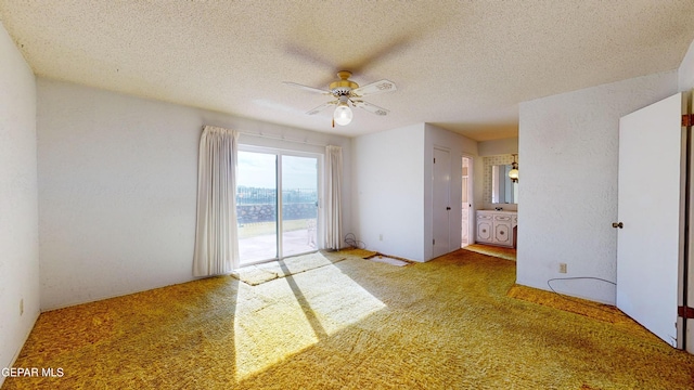 532 Satellite Dr, El Paso, TX 79912 - carpeted spare room featuring ceiling fan and a textured ceiling
