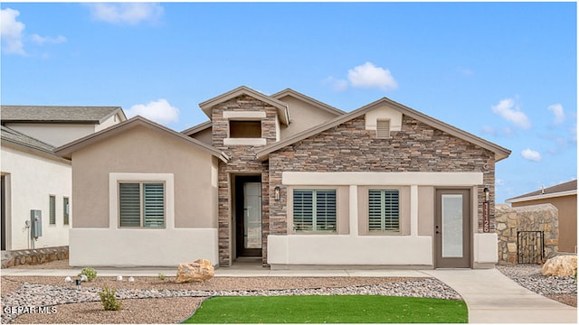 900 Stoke St, El Paso, TX 79928 - view of front of home featuring stone siding and stucco siding
