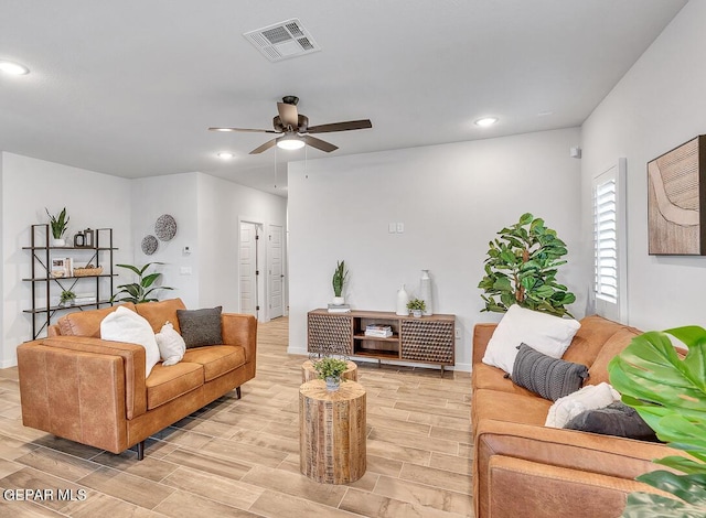 900 Stoke St, El Paso, TX 79928 - living room with a ceiling fan, light wood-type flooring, recessed lighting, and baseboards