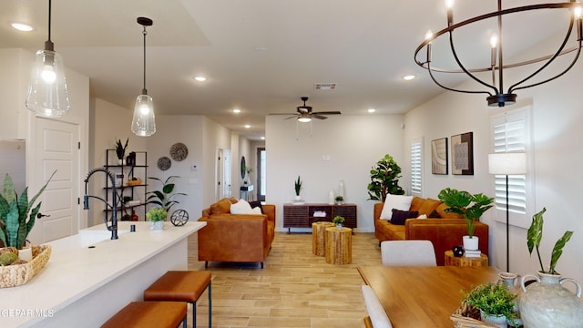 900 Stoke St, El Paso, TX 79928 - dining space featuring recessed lighting, light wood-type flooring, ceiling fan, and baseboards