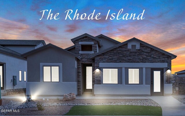 900 Stoke St, El Paso, TX 79928 - view of front facade featuring stone siding and stucco siding