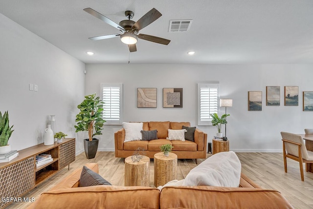900 Stoke St, El Paso, TX 79928 - living room featuring ceiling fan, recessed lighting, baseboards, and light wood-style flooring