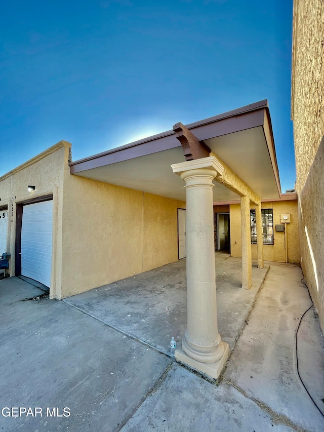 exterior space with a garage