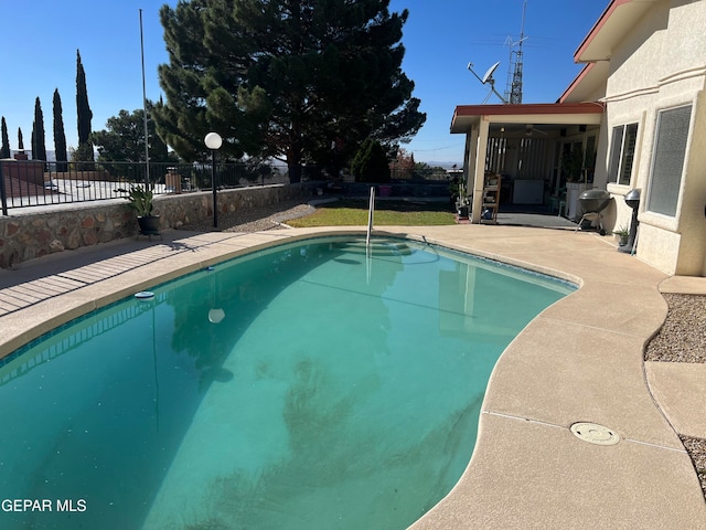 view of pool with a patio area