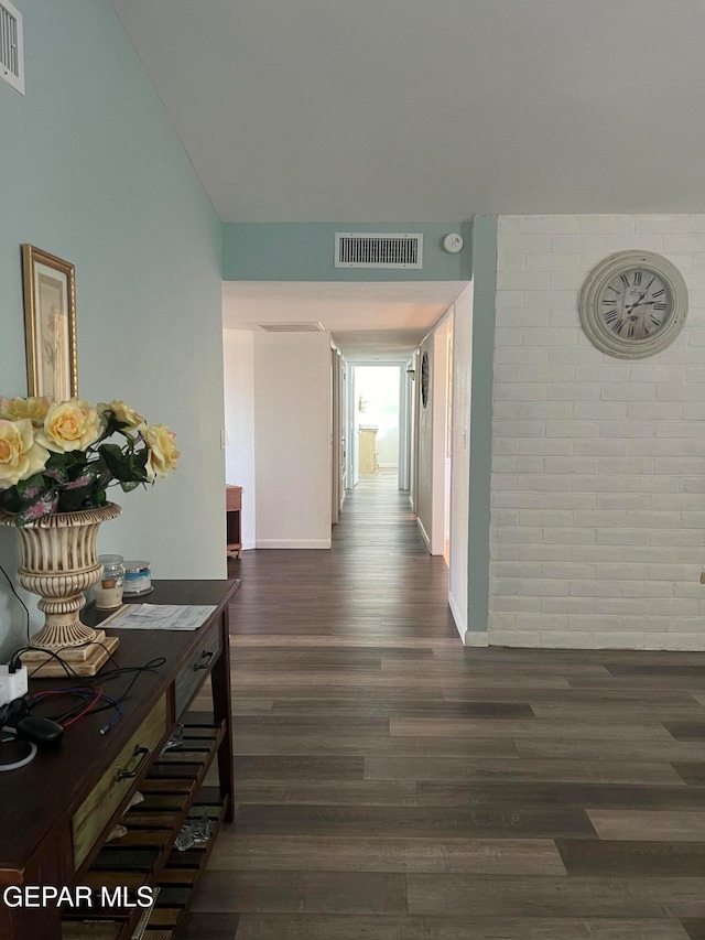 hallway with dark wood-type flooring