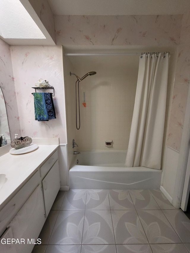 bathroom with vanity, shower / tub combo, and tile patterned floors