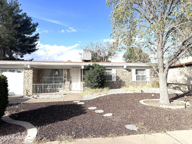10545 Springwood Dr, El Paso, TX 79925 - ranch-style house with brick siding and covered porch