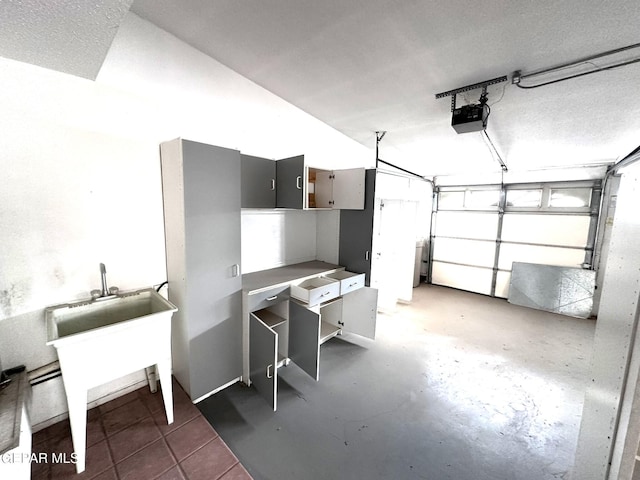 10545 Springwood Dr, El Paso, TX 79925 - garage with a garage door opener