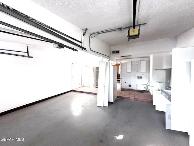 10545 Springwood Dr, El Paso, TX 79925 - garage with a garage door opener