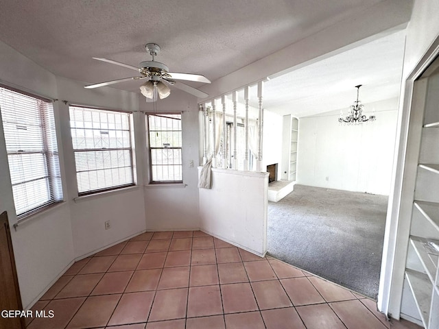 10545 Springwood Dr, El Paso, TX 79925 - unfurnished sunroom featuring a chandelier