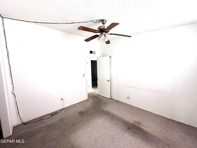 10545 Springwood Dr, El Paso, TX 79925 - empty room with carpet, a ceiling fan, and a textured ceiling