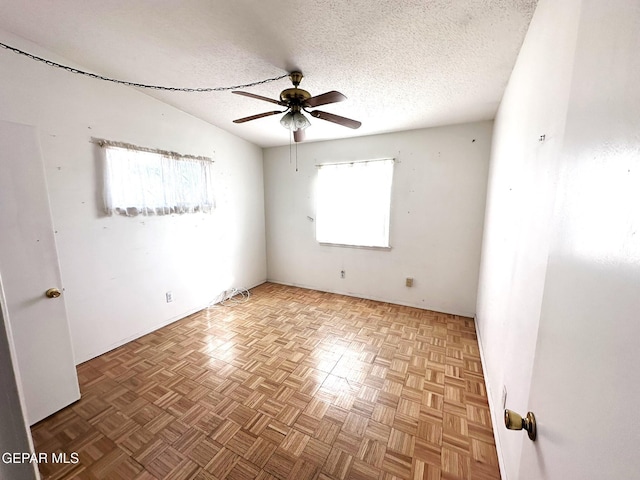 10545 Springwood Dr, El Paso, TX 79925 - spare room featuring ceiling fan and a textured ceiling