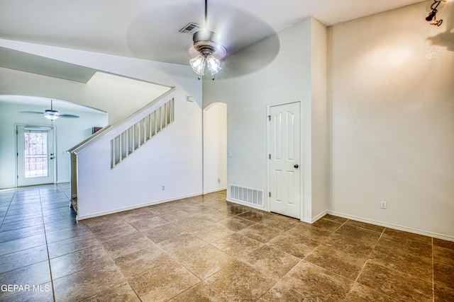 unfurnished room with ceiling fan