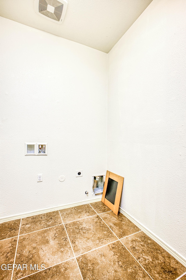 washroom featuring washer hookup, tile patterned floors, hookup for a gas dryer, and electric dryer hookup