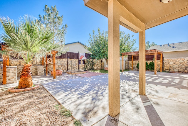 view of patio / terrace featuring a pergola