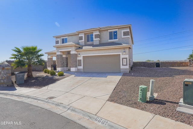 view of front of property with a garage