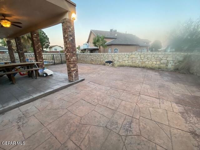 view of patio / terrace featuring ceiling fan