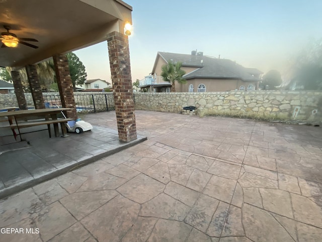 view of patio with ceiling fan