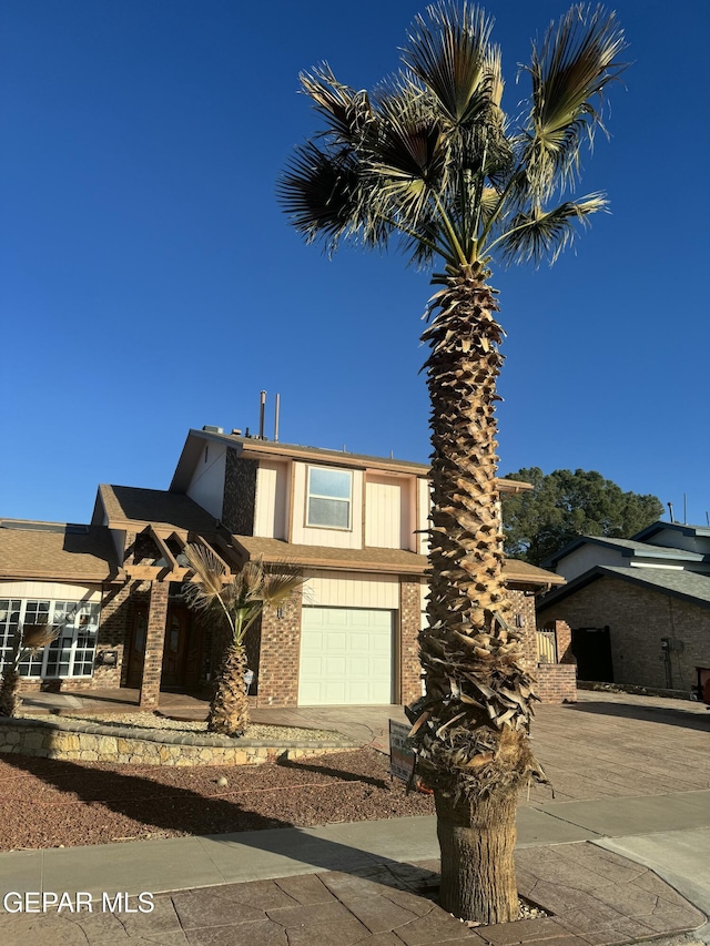 view of front of home with a garage