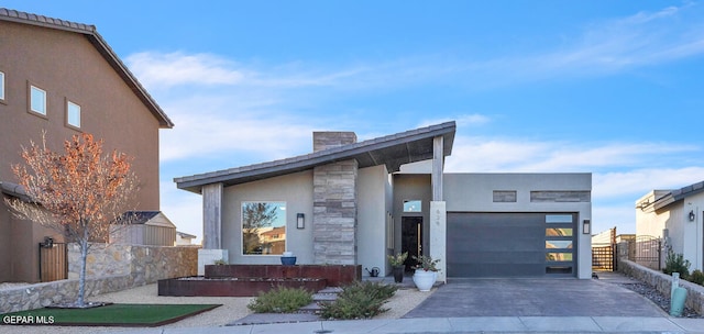 modern home featuring a garage