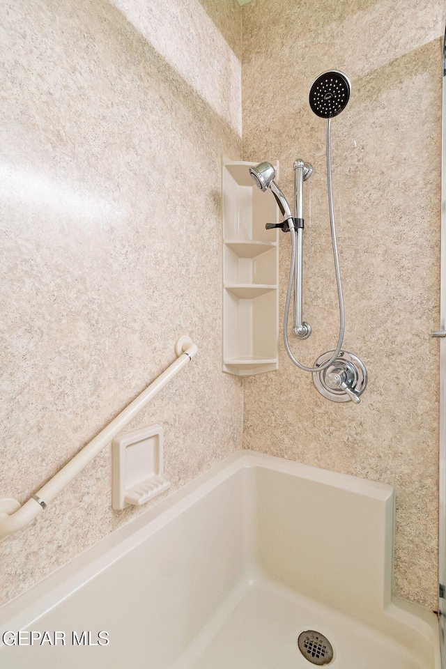 bathroom with walk in shower