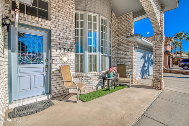 doorway to property featuring a garage