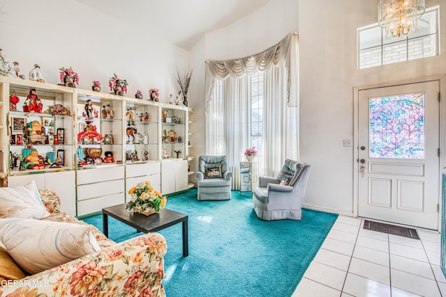 interior space featuring a notable chandelier and tile patterned floors