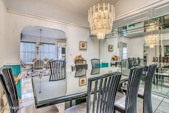 dining room featuring ornamental molding, light tile patterned floors, and a notable chandelier