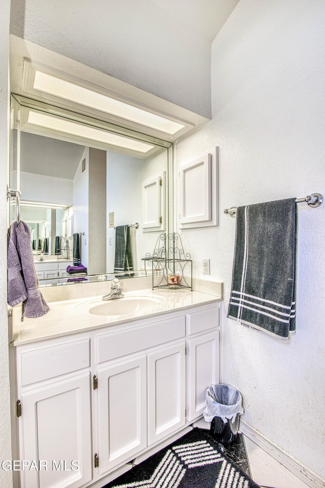 bathroom featuring vanity