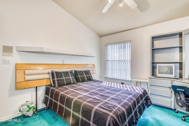 bedroom with a textured ceiling, ceiling fan, lofted ceiling, and carpet floors