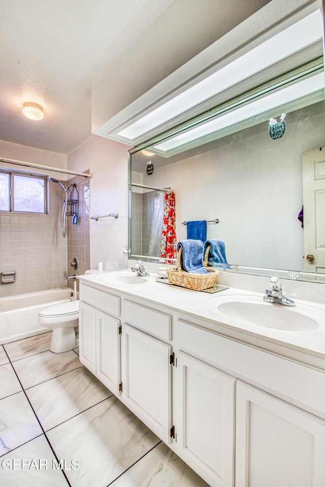 full bathroom with toilet, tile patterned flooring, shower / tub combo with curtain, and vanity