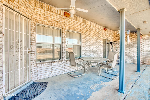 view of patio featuring ceiling fan