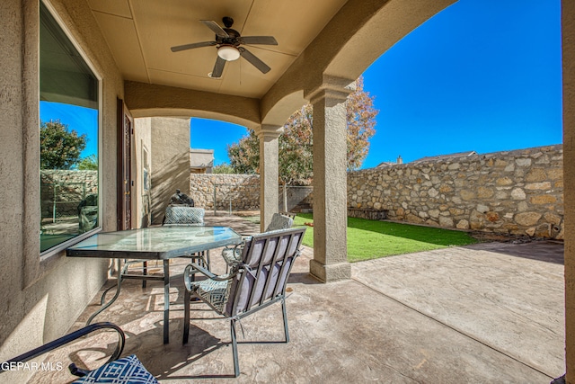 view of patio with ceiling fan