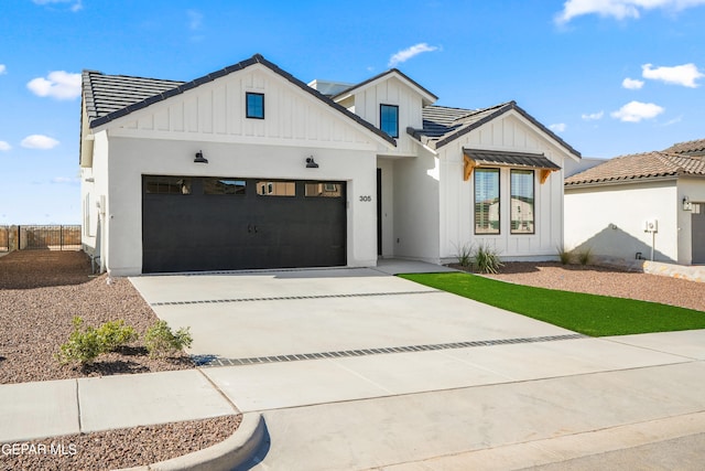 modern farmhouse style home with a garage