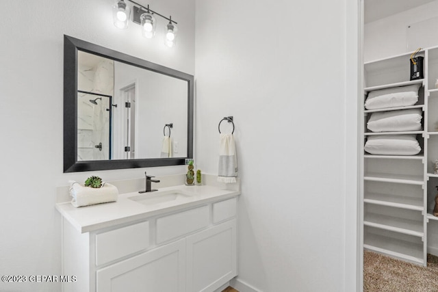 bathroom with vanity and walk in shower