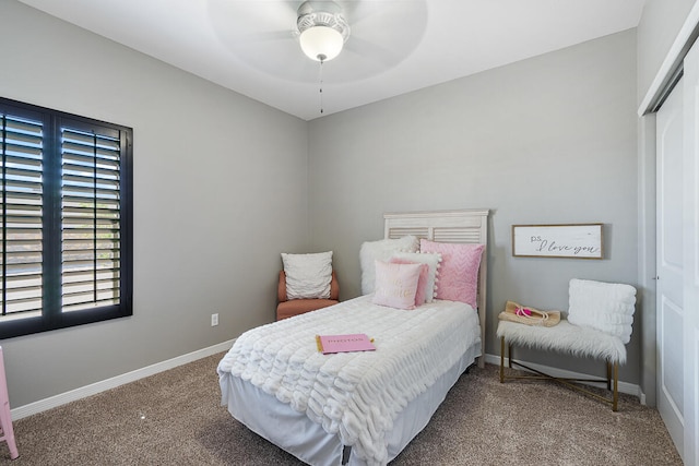 bedroom with carpet floors, a closet, and ceiling fan