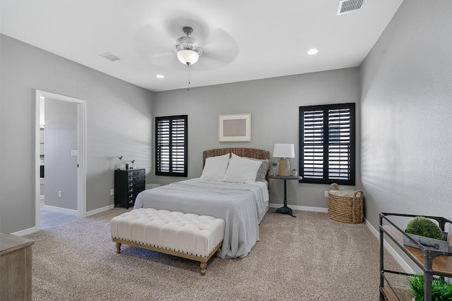 carpeted bedroom featuring ceiling fan