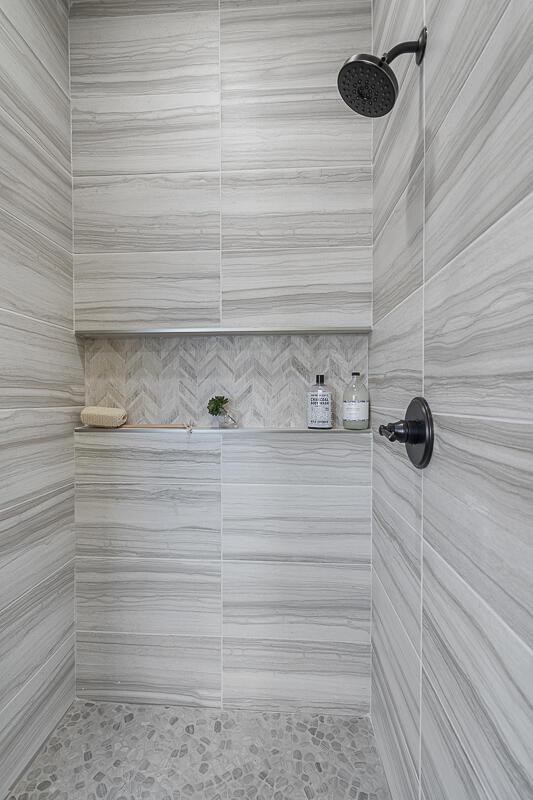 208 Playa Vista St, Horizon City, TX 79928 - full bathroom with a tile shower