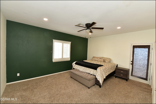 carpeted bedroom featuring ceiling fan