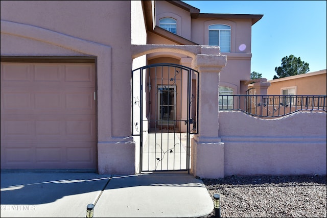 entrance to property featuring a garage