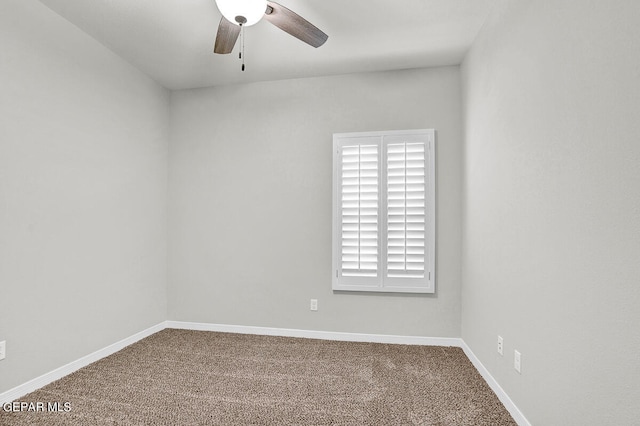 spare room with ceiling fan and carpet floors